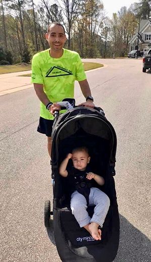 man with baby in stroller