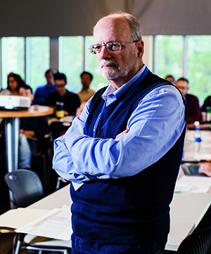 barton haynes in a classroom with students in background