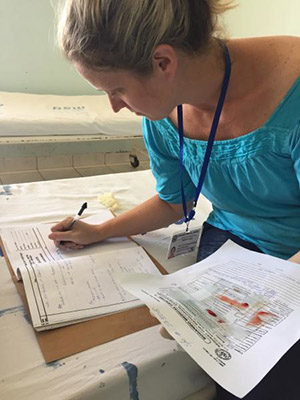 woman writing in a notebook