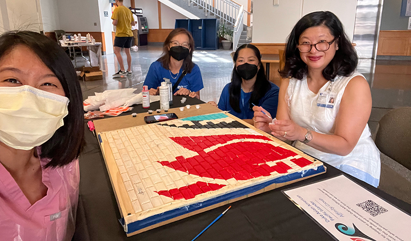 Suephy Chen and others working on the AAPI polyptych