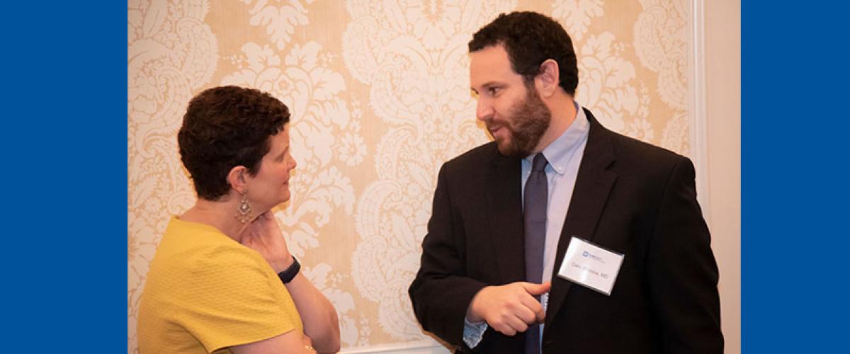 DCLP faculty speaking with DCLP director 